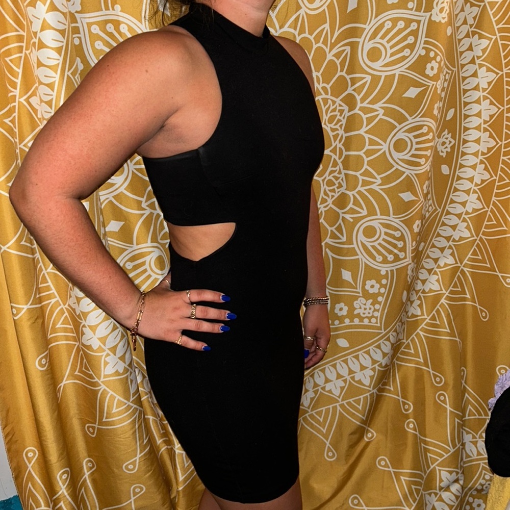 Black cocktail dress with slits on waist